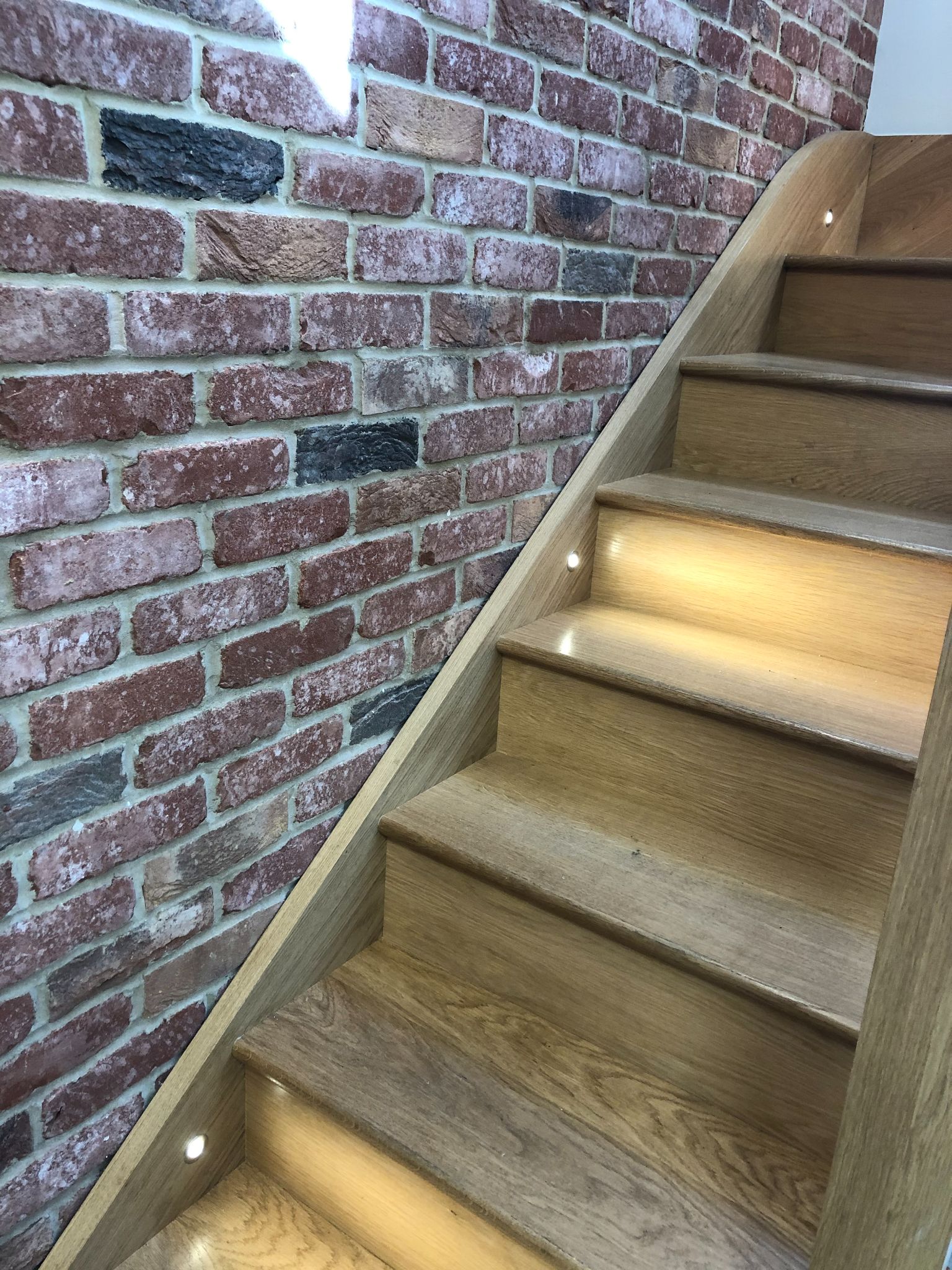 INSTALLATION OF LED SPOTLIGHTS ON STAIRS